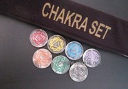 Show details for Crystal Quartz Engrave Chakra Colourful Disc set with velvet purse Picture of Crystal Quartz Engrave Chakra Colourful Disc set with velvet purse