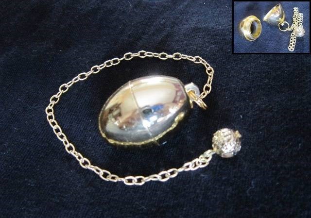 Picture of Egg shape Metal Golden pendulum