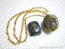 Picture of Golden Lapis ANKH Tumble spring cage neckalce, Picture 1