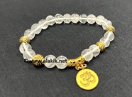 Show details for Crystal Quartz 8mm beads Bracelet with OM Charm Picture of Crystal Quartz 8mm beads Bracelet with OM Charm